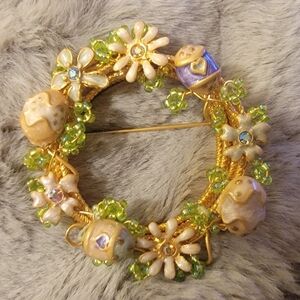 Elegant Gold and Green Floral Brooch